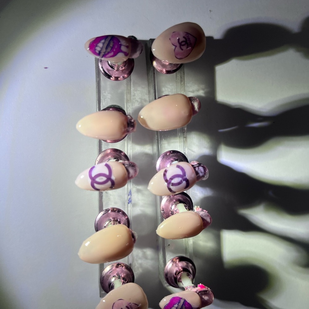 CHANEL Pale Pink Press-On Nails with Purple Logo Accents